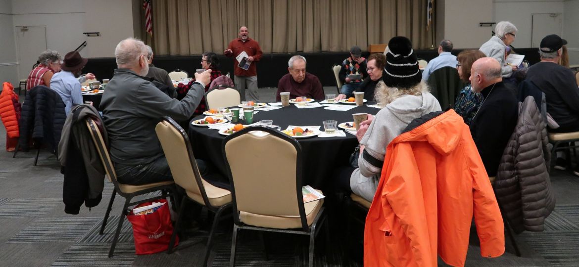 Josh Culter of the Board of Jewish Education leads the Tu BShevat Sedar Lunch on February 13, 2025.